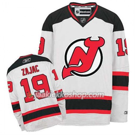 Reebok Miehille NHL New Jersey Devils Pelipaita Travis Zajac #19 Vieras Valkoinen
